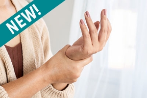 Close-up of person holding a painful wrist and hand, illustrating joint pain symptoms evaluated by the Arthritis Panel blood test for Rheumatoid arthritis.